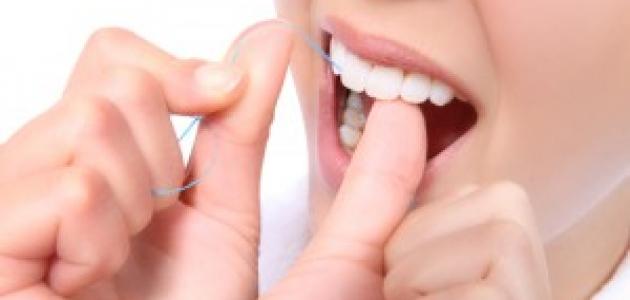 أهمية استخدام خيط الأسنان